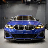 BMW G20 mit gelbem Tagfahrlicht zur Verbesserung der Sichtbarkeit bei Tageslicht